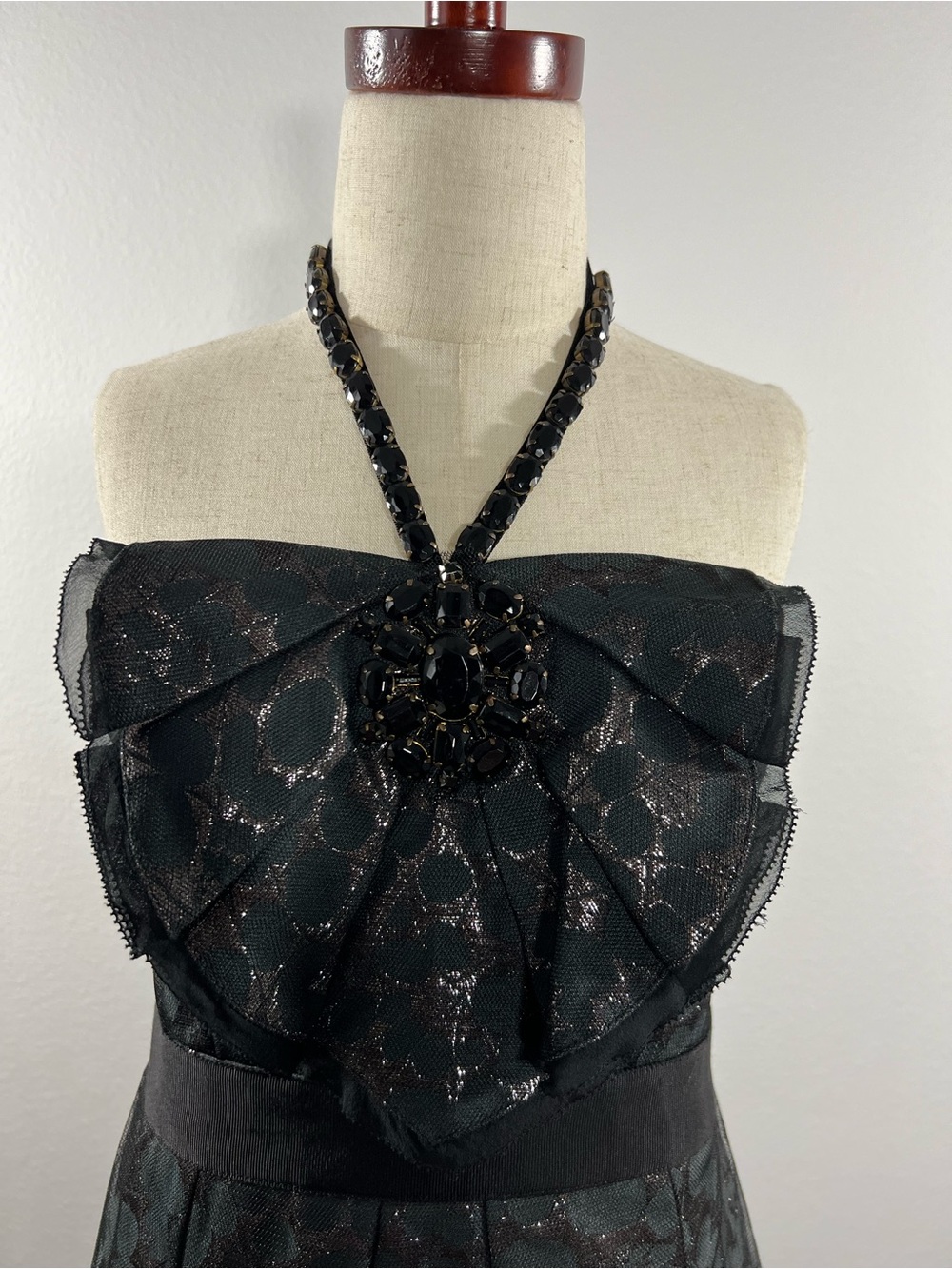 BCBGMaxAzria Black Strapless Lace-Overlay Cocktail Dress with Jeweled Brooch